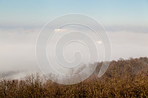 Roof of a highrise building in the fog