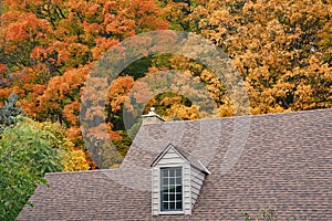 Roof of house with dormer window photo