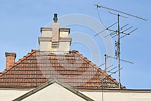 Roof of a house with television antenna