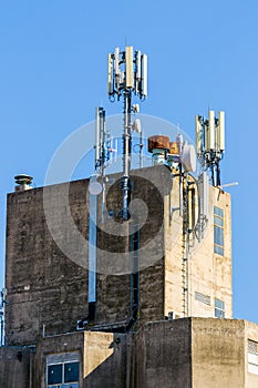 Roof of industrial building with GSM antennas
