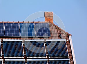 Roof installed solar panel detail under blue sky