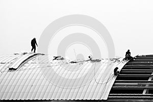 Roof Installer in black and white