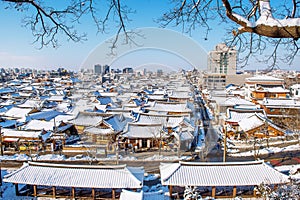 Roof of Jeonju traditional Korean village covered with snow, Jeonju Hanok village in winter, Korea.