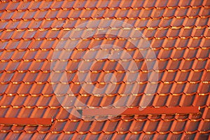 Roof with metallic brown tiles.