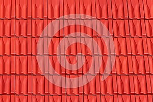 Roof with metallic red tiles.