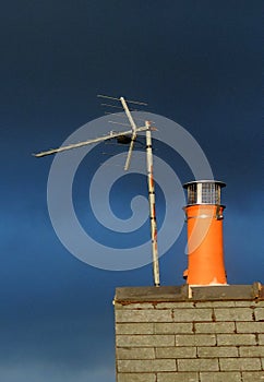 Roof, new chimney, aerial and sky.