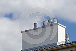 Roof of the new modern house with gutter and ventilation chimneys