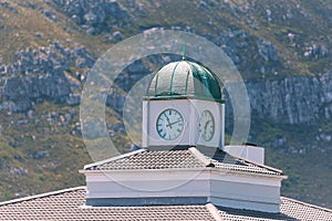 Roof of old building with clocktower in Hermanus