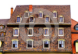 Roof of the old German house with dormer window