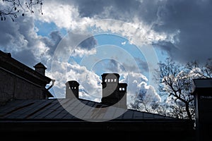 Roof of an old house with chimneys