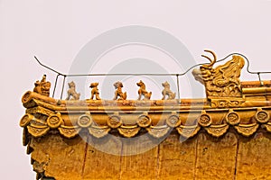 Roof panels with small mystical figures