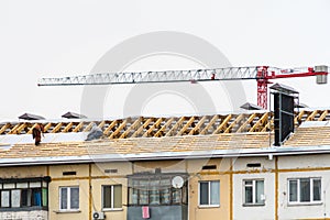 Roof repair in an apartment building. Work at height