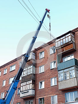 Roof repair a five-story brick building in the city of Omsk