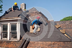 Roof Repair by Migrant Workers