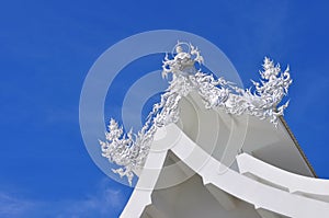 Roof and sculptures of Wat Rong Khun temple