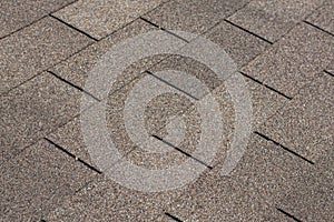 Asphalt roof shingles background texture