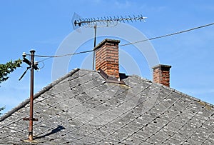 Roof with smoke stack and antenna