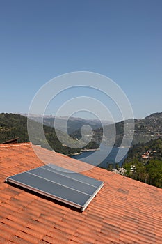 Roof with a solar panel