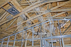 Roof and support structures in new home photo