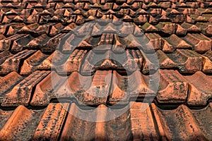 Roof tiles. Roofing texture. Red corrugated tile element of roof