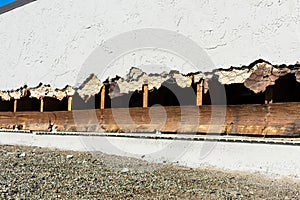 Roof to wall stucco step flashing replacement