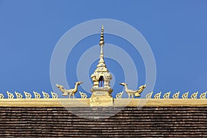 Roof top on blue sky of Laos temple