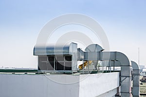 Roof top building air ventilation flow system odor vent