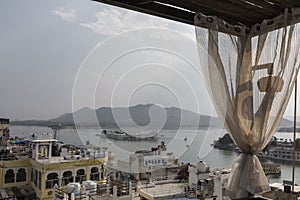 Roof top restaurant with beautiful view to Lake Pichola in the m