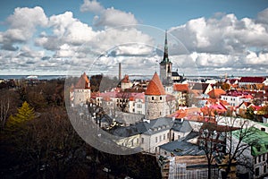 The roof tops of Tallinn city old town and tower of St Olaf`s church