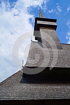The roof and the tower covered with shingles of the wooden church from Botiza, Maramures County.