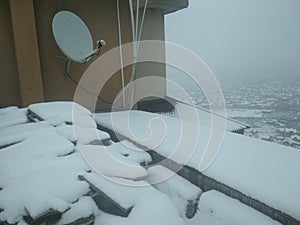 Roof Tower Dish Snow In Valley Kashmir photo
