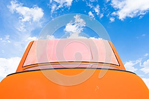 Roof and trunk of the car on the background of the sky