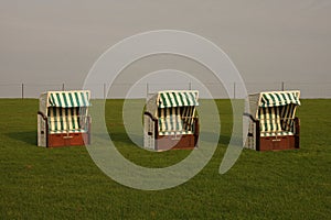 Roofed wicker beach chair