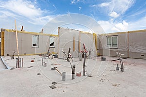 Roofer builder workers with crane installing structural Insulated Panels SIP. Building new frame energy-efficient house.