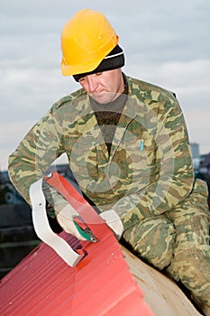 Roofer with hand snips