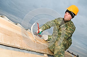 Roofer with hand snips