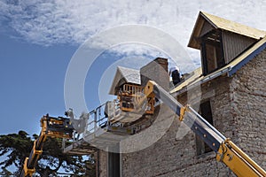 Roofer on a roof