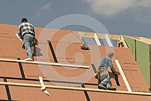 Roofers Constructing New Home Revised