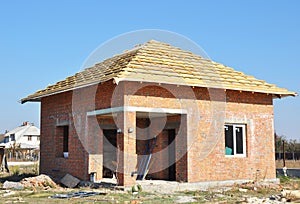 Roofing Construction Exterior with Brick House Wall Construc