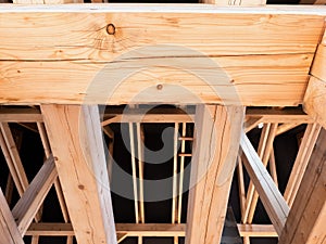 Roofing construction with wooden long beams