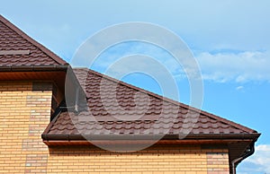 Roofing with New House Rain Gutter Waterproofing. Guttering Down pipe Fittings.