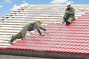 Roofing work with metal tile