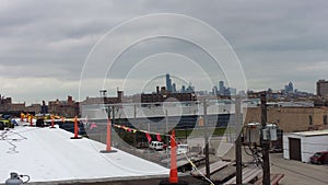 Roofing Work in progress, Commercial flat roof with safety flags in Chicago