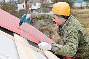 Roofing works with screwdriver