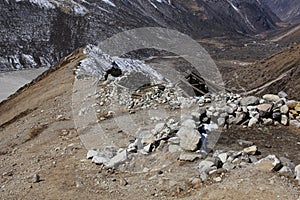 Roofless yak herder huts on the way to Tserko Ri, Langtang valley, Nepal.