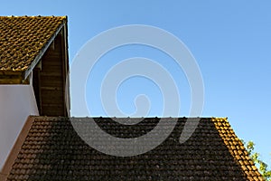 The roofs on background of blue sky