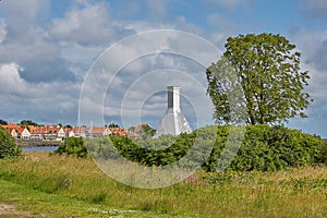 The roofs and chimneys of very small smoke houses so typical and famous for small village of Svaneke on Bornholm island in Denmark