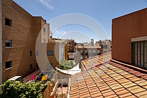 Roofs of a house with clay tiles and bricks of the same material