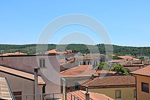 Roofs of houses in an Italian town photo