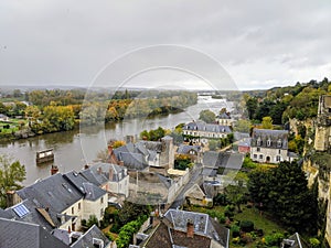 Roofs of medieval European Ambroise town and loir river. Chaumont Castel in Loire Valley, France